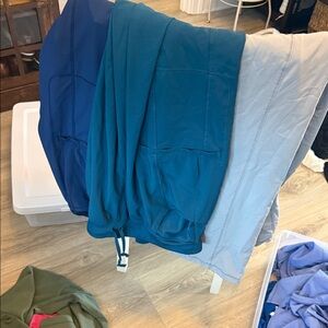 Three pair Xfinity Cherokee scrub pants extra large gray green and blue